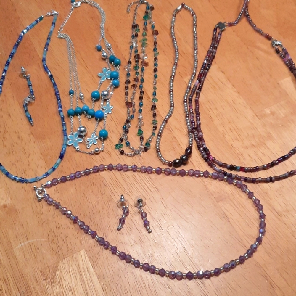 Womens bead necklaces and earrings.